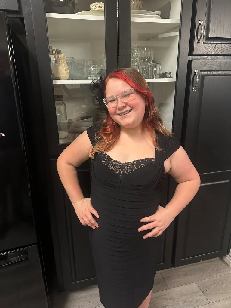 Ava, founder of Cloud Kiss Cosmetics, smiling for a portrait